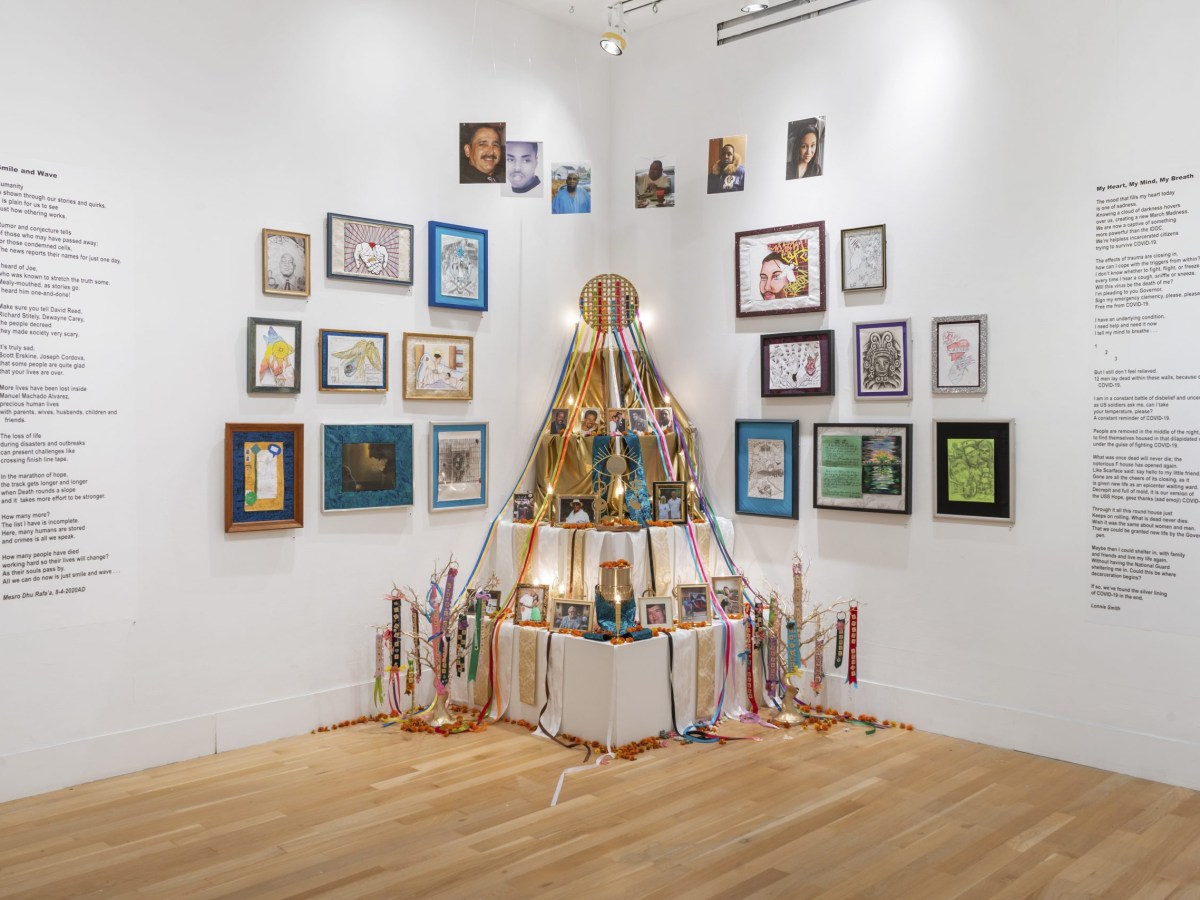 In a corner of the gallery is a beautiful altar, decorated with streamers, candles, and flowers. Surrounding the altar is a plethora of hung work made by incarcerated artists, including pencil drawings, collage, and paintings.