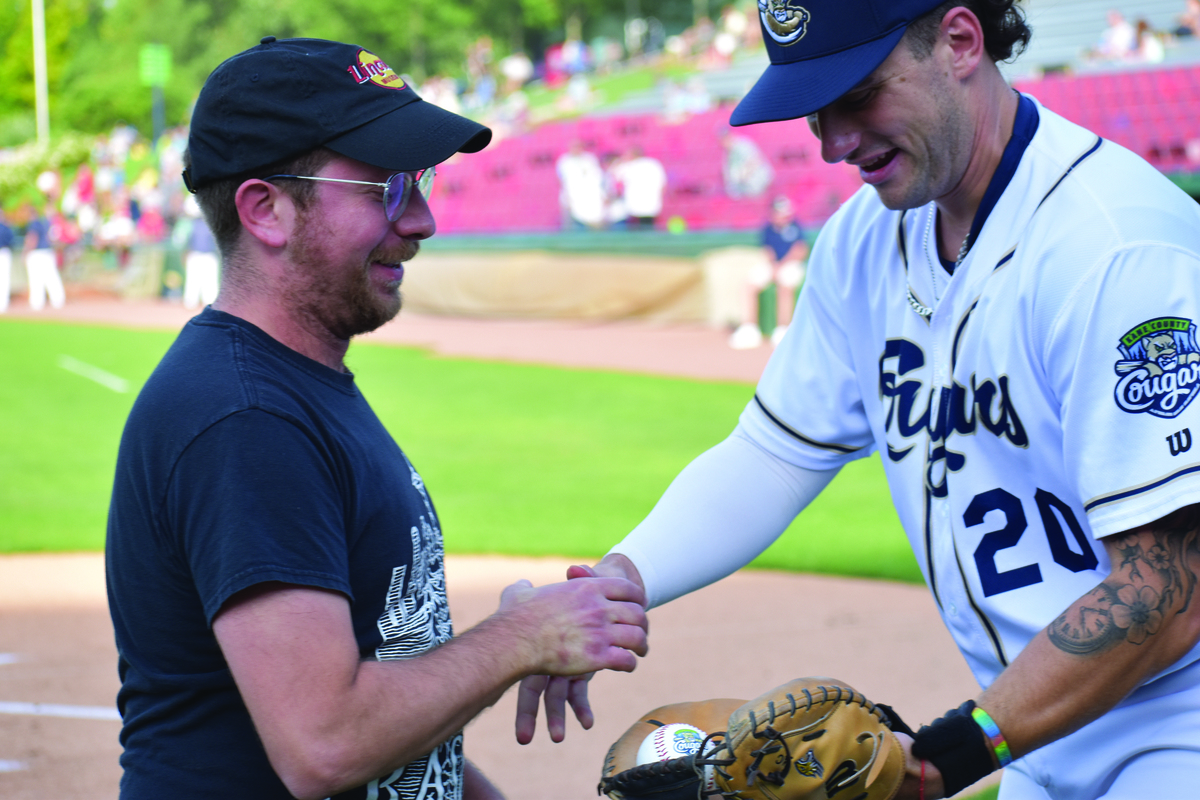 Leor Galil greets a Kane County Cougars catcher