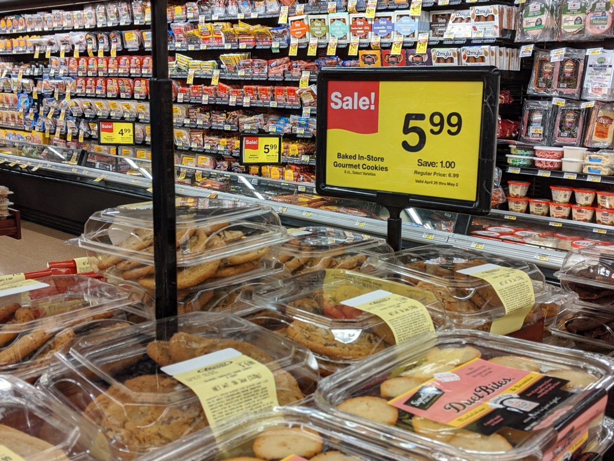 Packaged cookies and other items on display at a supermarket