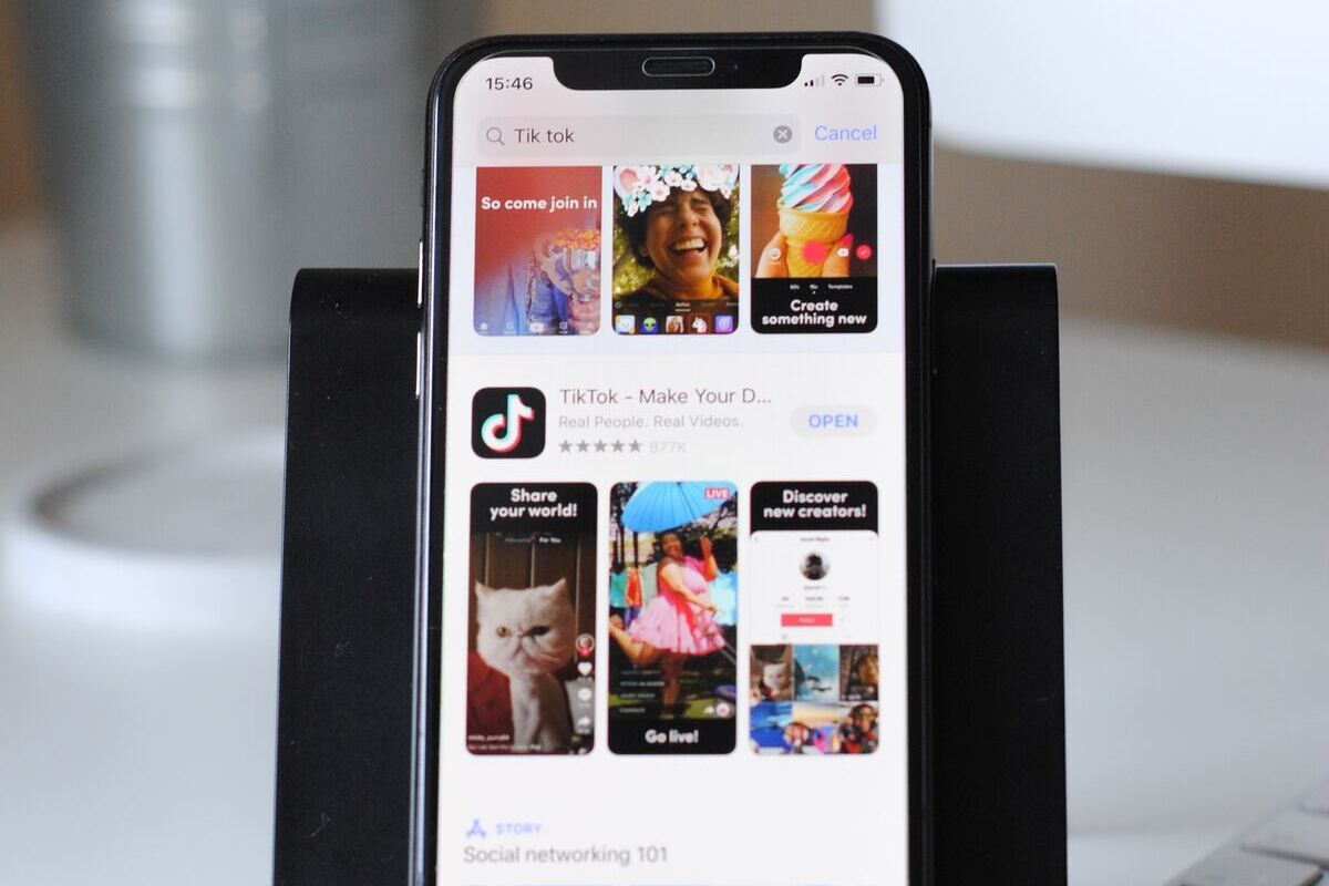 close up of an iphone with tiktok displayed on it